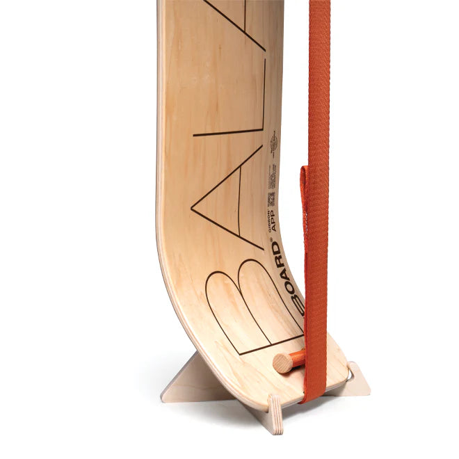 Wooden balance slackboard with stand on a white background