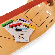 Wooden board with cards on top, featuring the GIBBON brand.