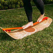 Person using a sunbeam slackboard on a lawn