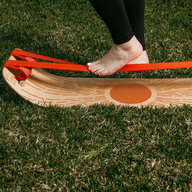 Person standing on a sunbeam slackboard plus on a lawn